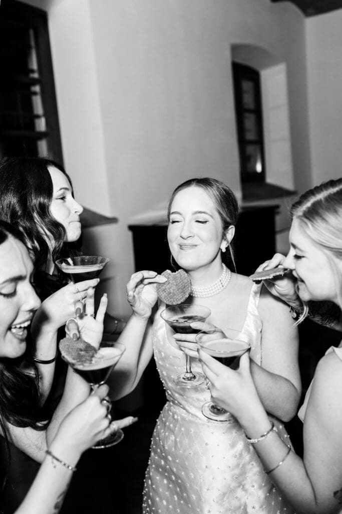 Hannah and friends with espresso martinis, black and white